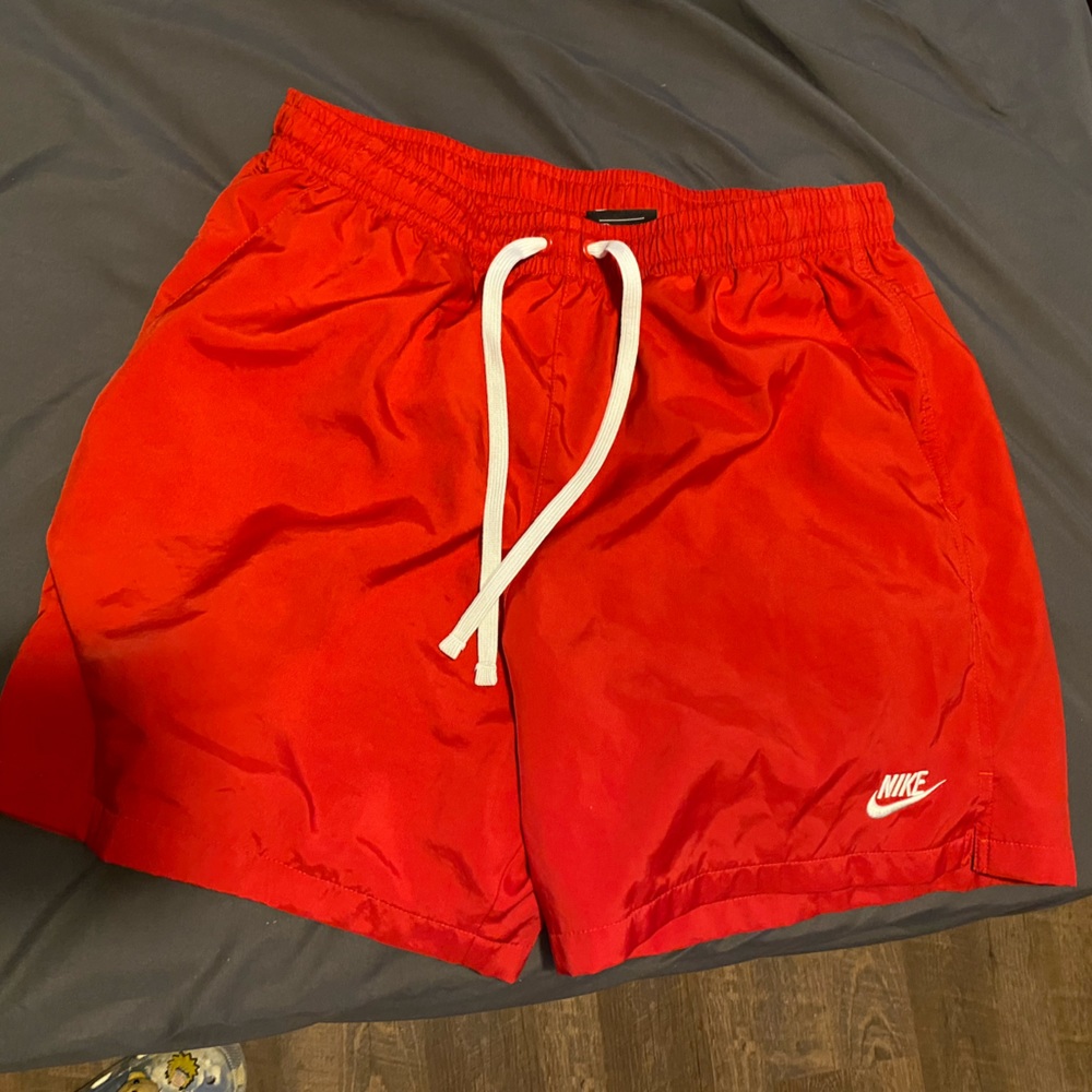 Red nike shorts